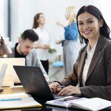 medium-shot-woman-working-laptop